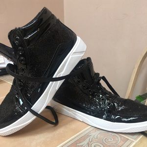 High top hip hop sneakers.